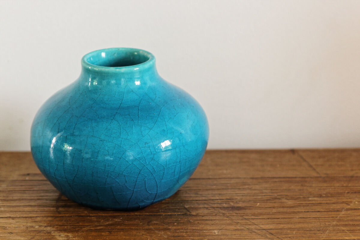 Glazed terracotta onion vase, signed
