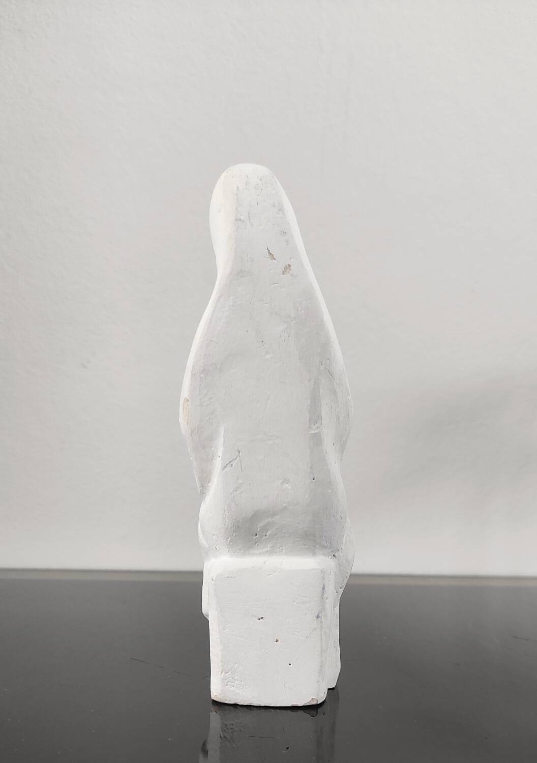 Vintage white plaster statuette of the Virgin Mary.