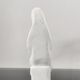 Vintage white plaster statuette of the Virgin Mary.