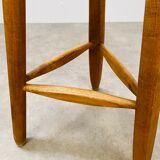 Brutalist bar stool in tripod elm