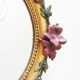 Miroir en bois doré avec fleurs