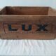 Ancienne caisse publicitaire en bois LUX