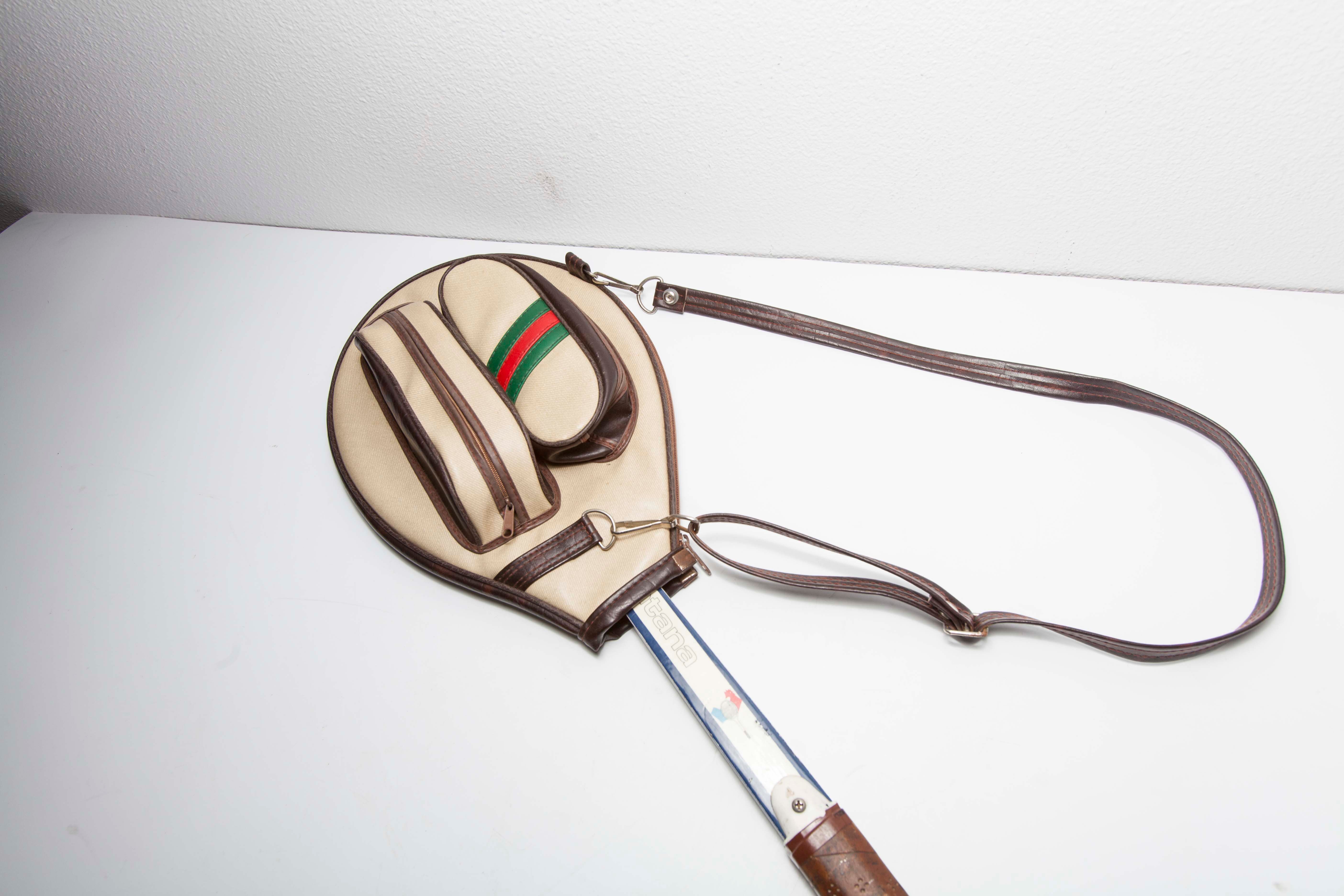 Blue Montana M505 racket with leather bag