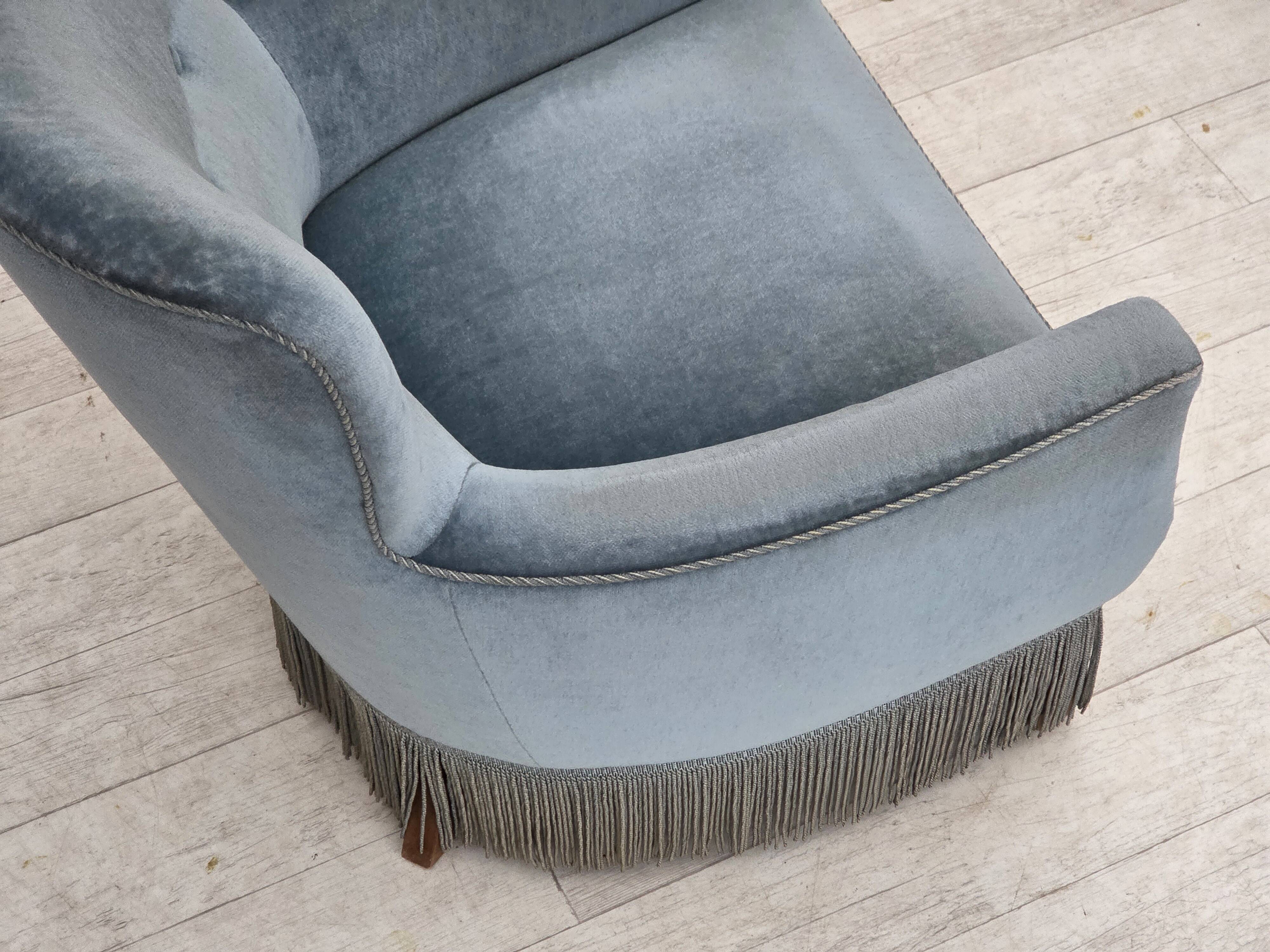 1970s, Danish armchair with footstool, blue furniture velour, oak wood legs