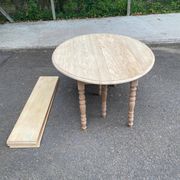 Renovated Louis Philippe round extendable dining table with flaps and 3 extensions.