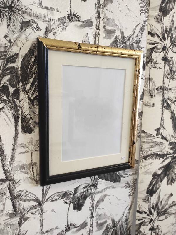 Black frame and gold leaf