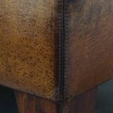 Hocker/coffee table made of sheepskin