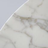 Tulip dining table in marble by Eero Saarinen for Knoll International.