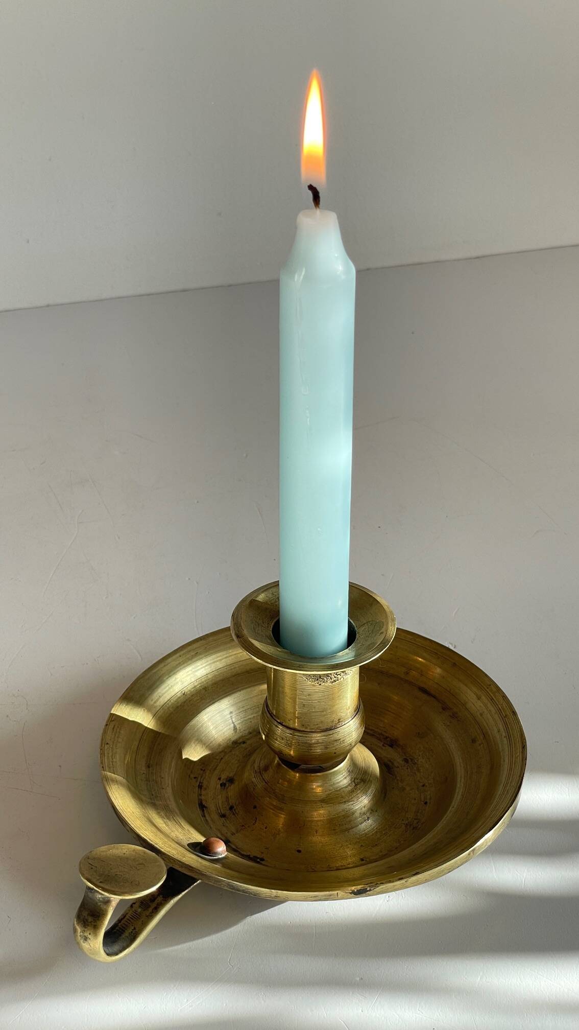 Antique solid bronze hand candlestick