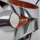 Massive Belgique three-armed waterfall pendant lamp in chrome and orange lacquer