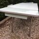 Formica table set with extensions + 4 Plastilux chairs