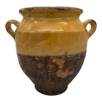 Old candied pot in glazed yellow terracotta XIX th century