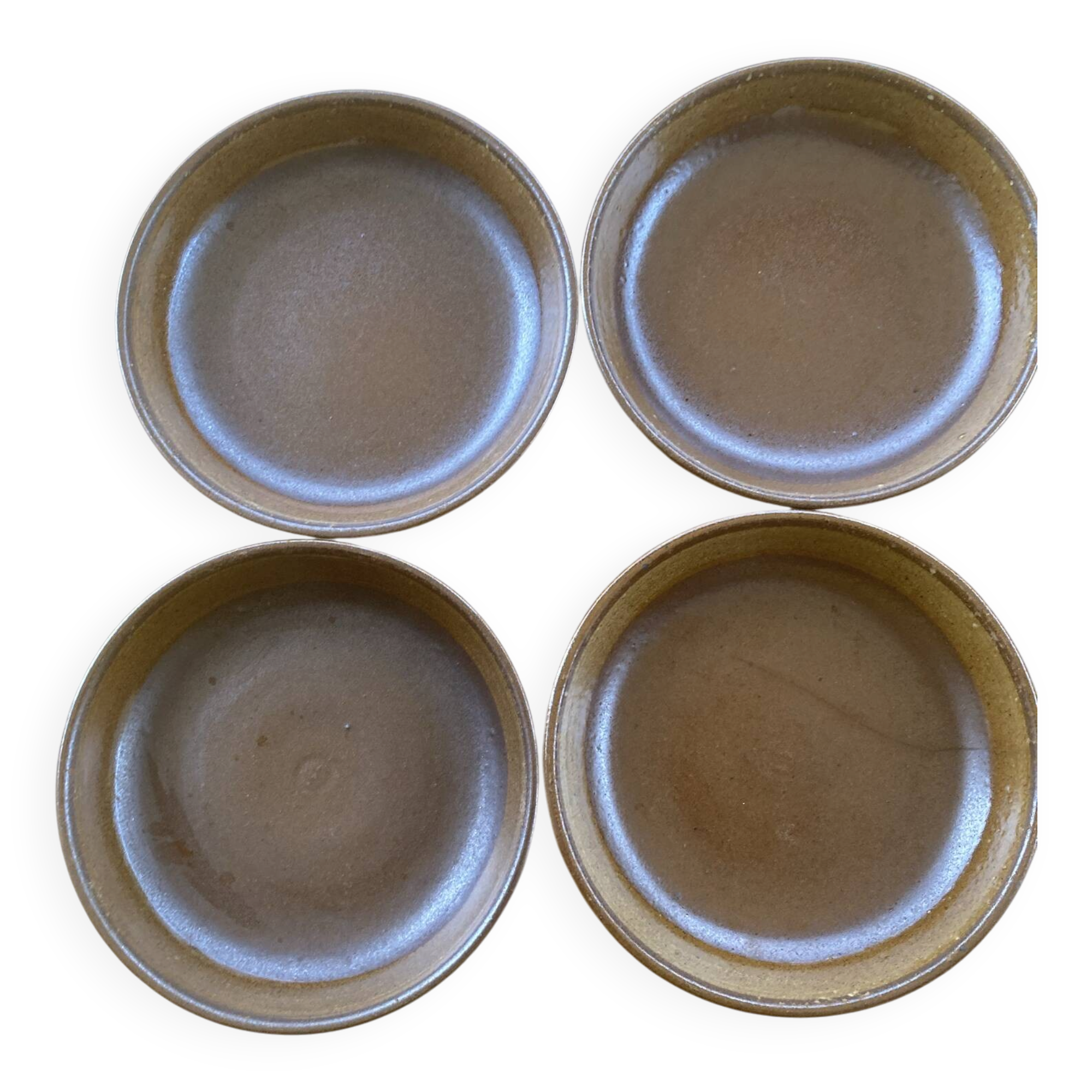 Deep plates made of organic, wild, earthy marsh clay.