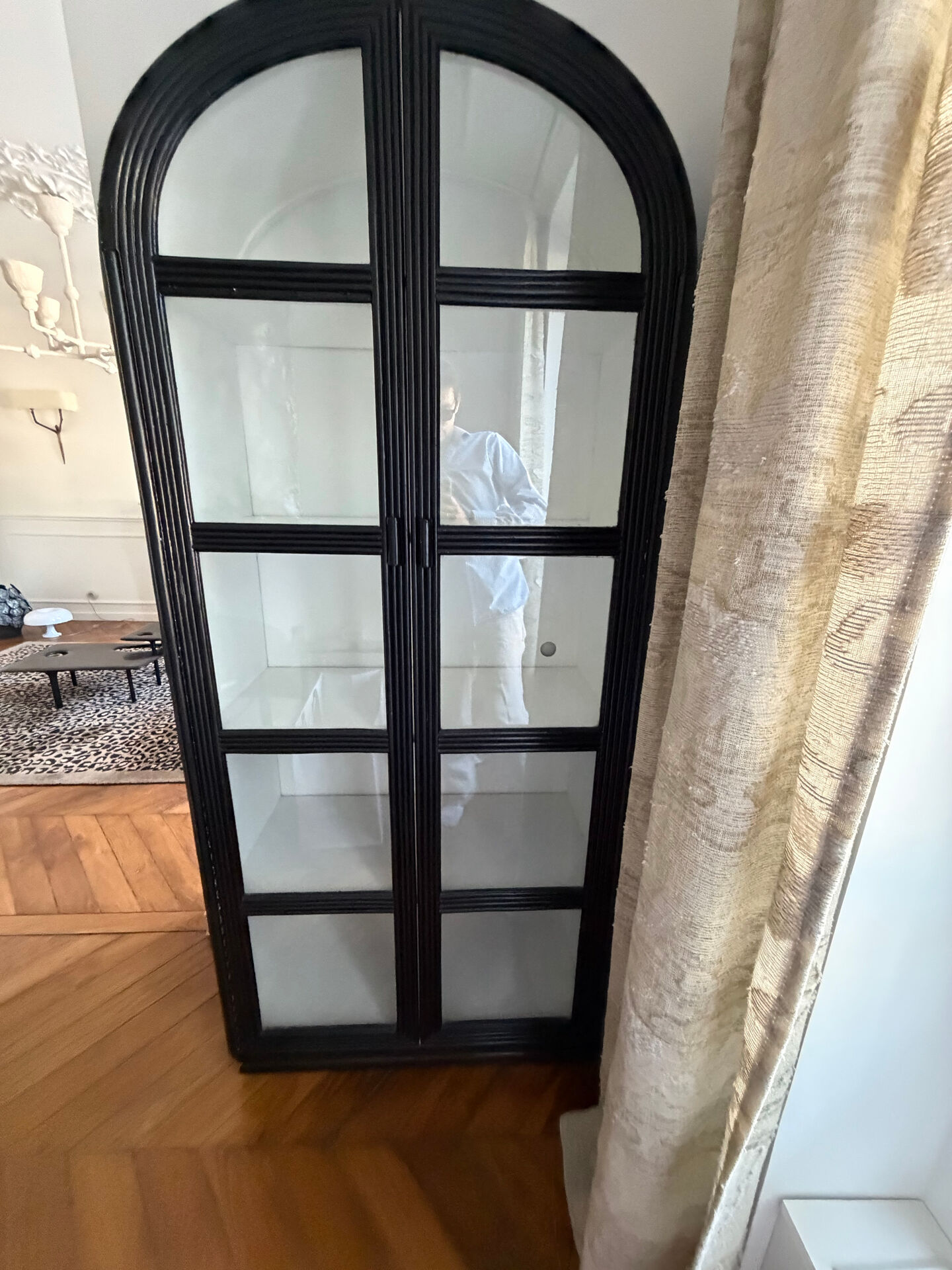 Black woven wood display cabinet