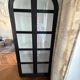Black woven wood display cabinet