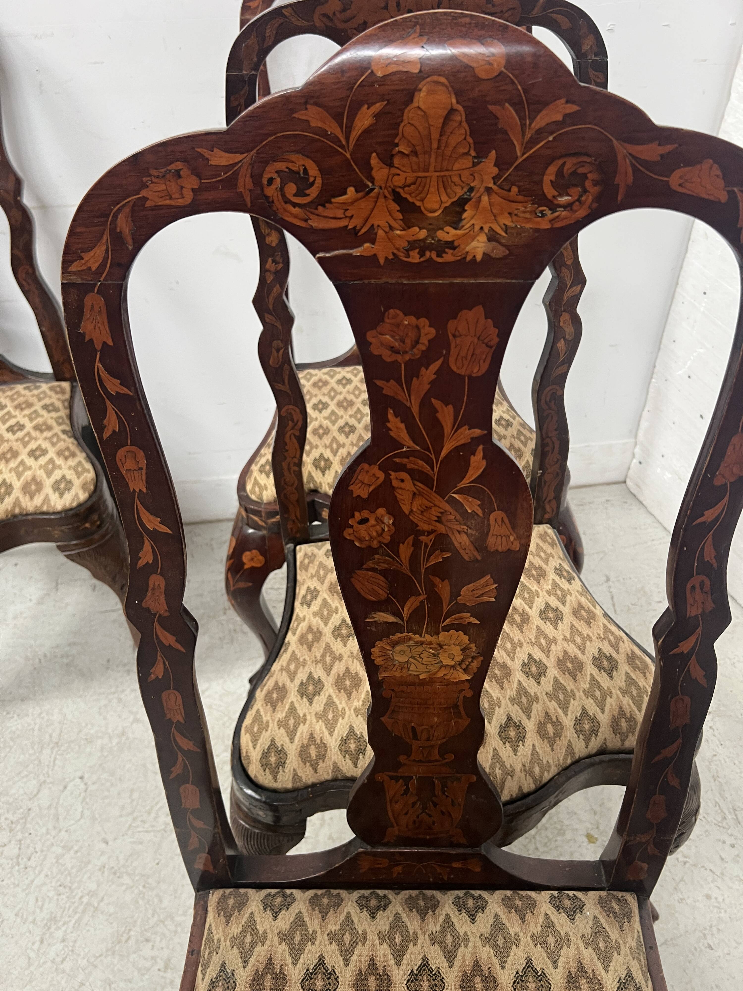 Set of eight Dutch marquetry chairs from the 19th century.