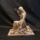 Statuette of a woman in gilded cast iron (Joan of Arc?)