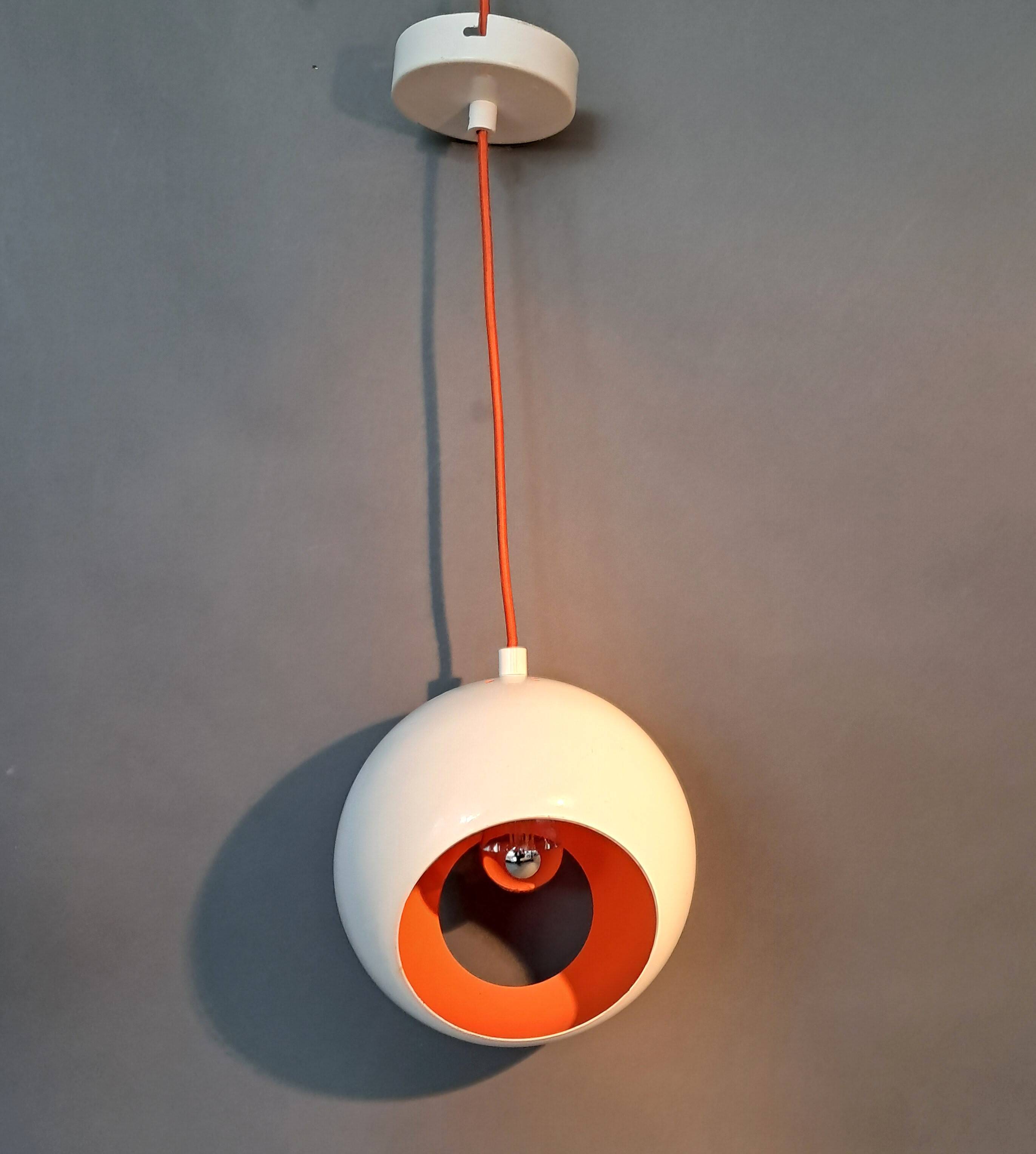 White openwork pendant light with orange interior 1970/1980.