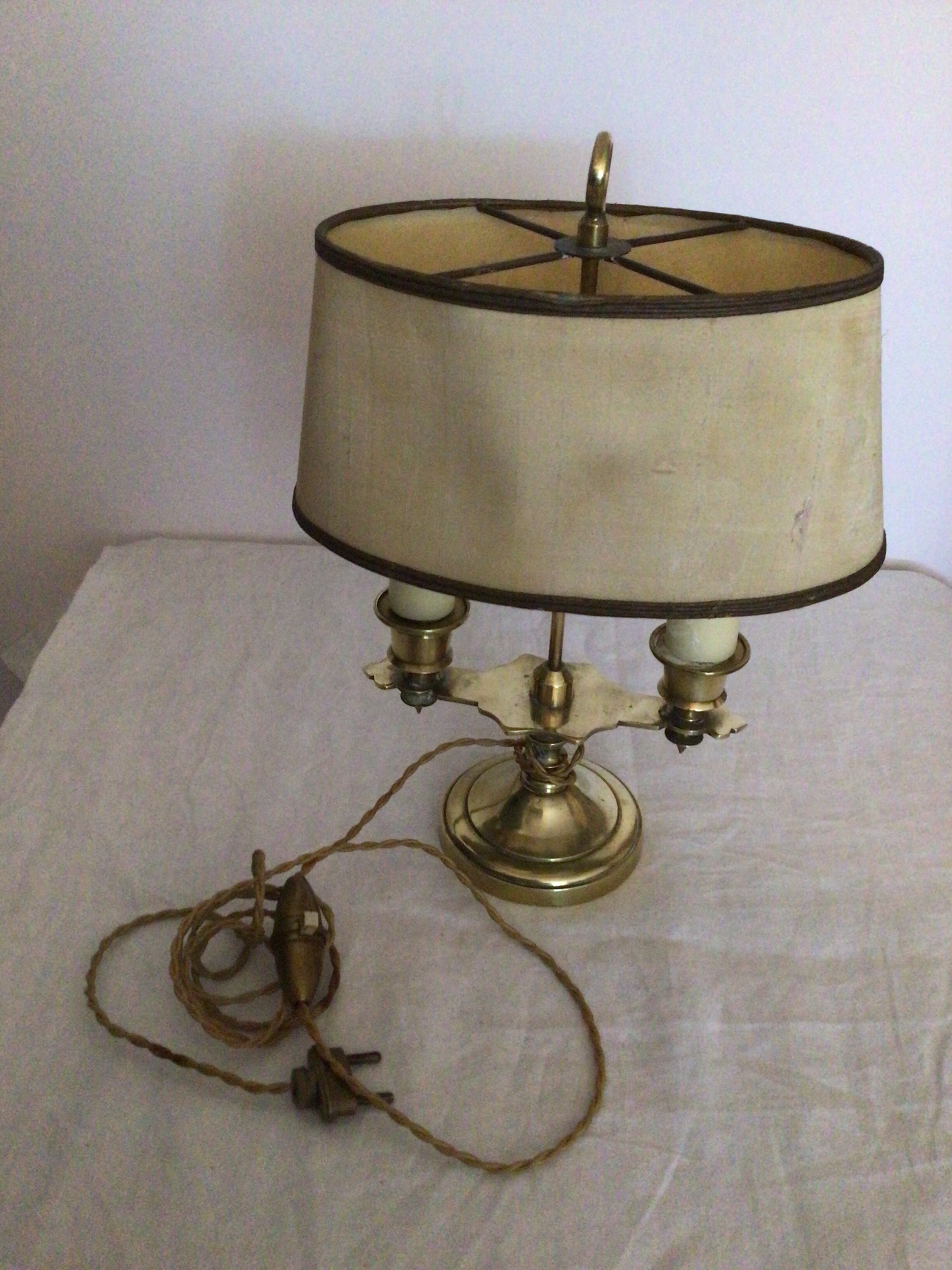 Old golden brass hot water bottle lamp with 2 arms of light