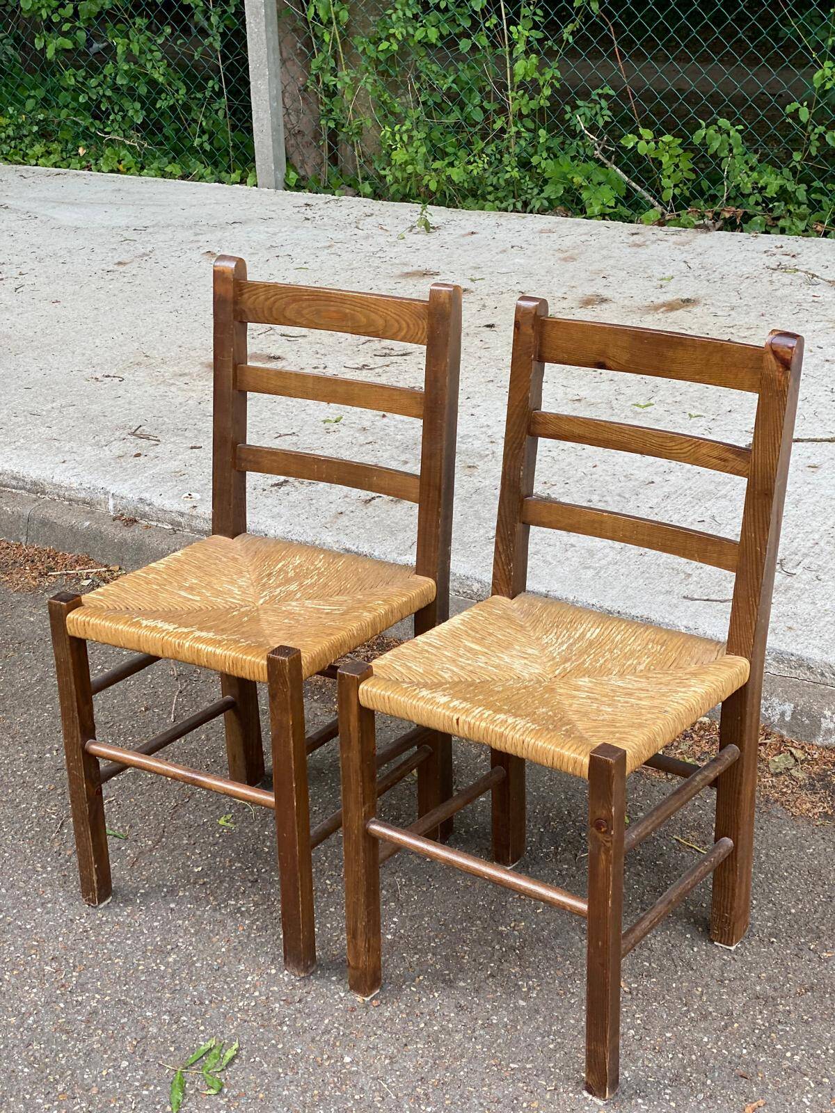 2 solid wood and straw chairs