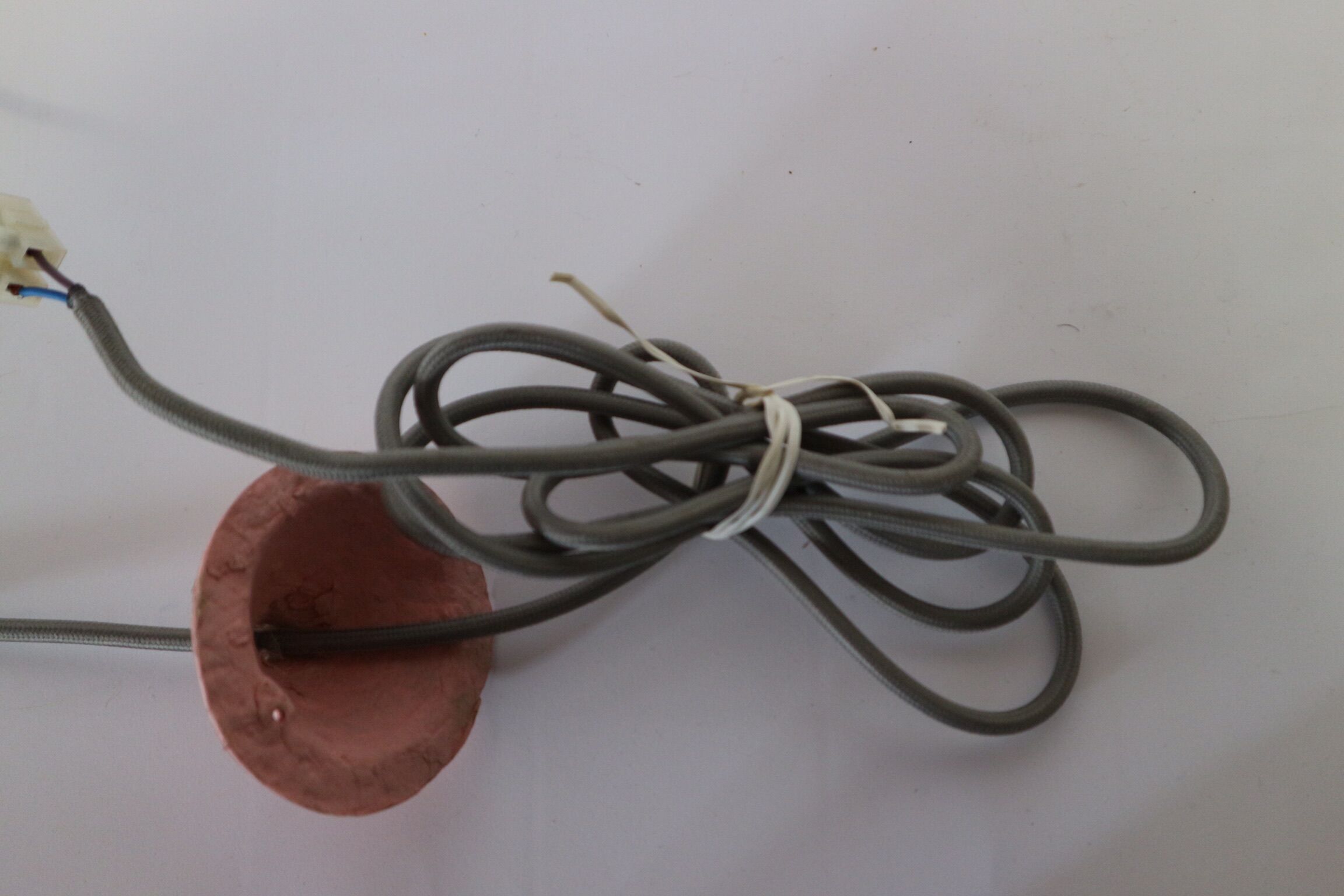 Two lamps/ pendant lamps in recycled cardboard, pink and green, seletti