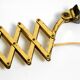 1950s brass extendable scissor wall lamp with aluminum diabolo shade in red
