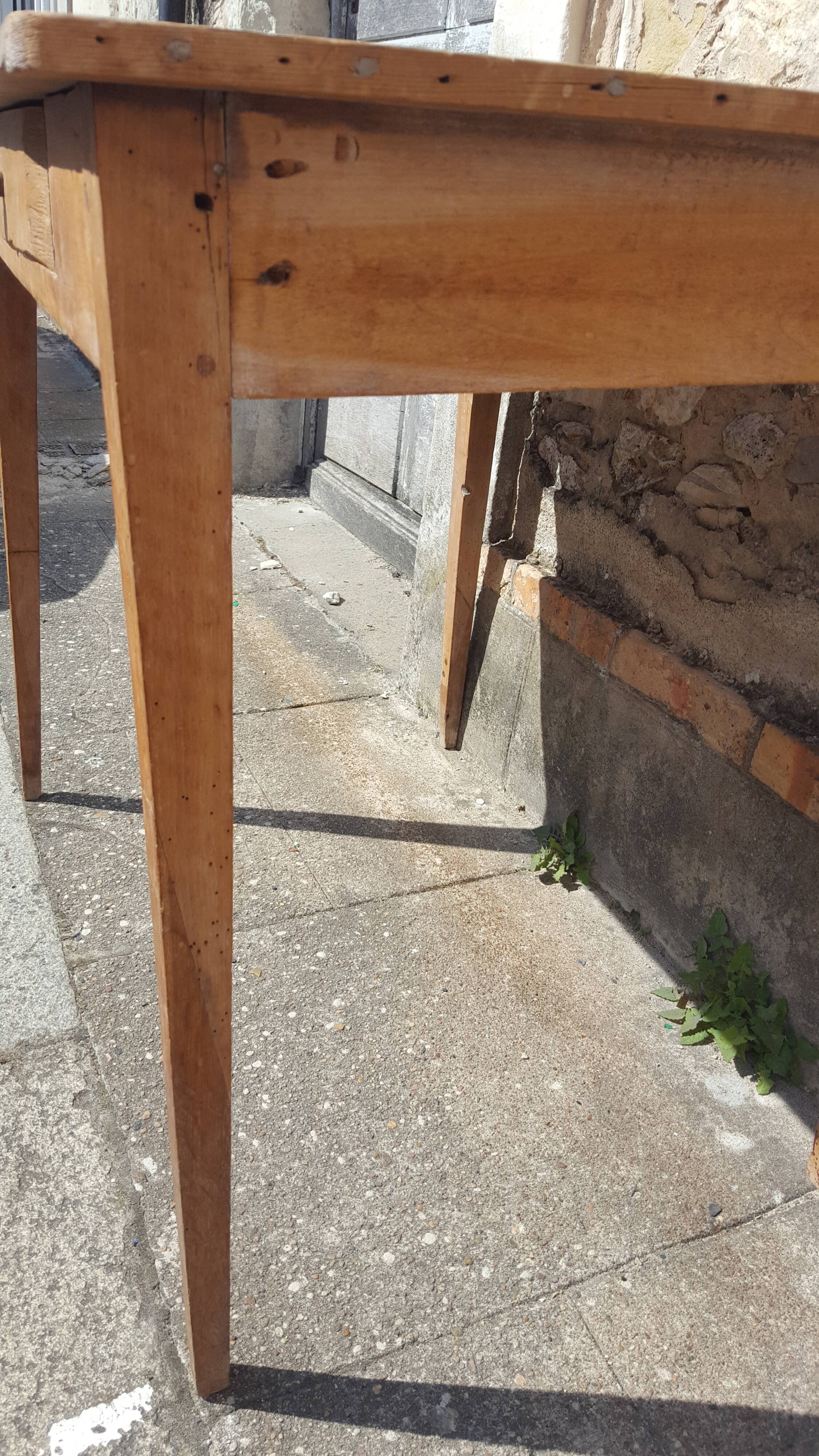 Raw wood farm table with drawer