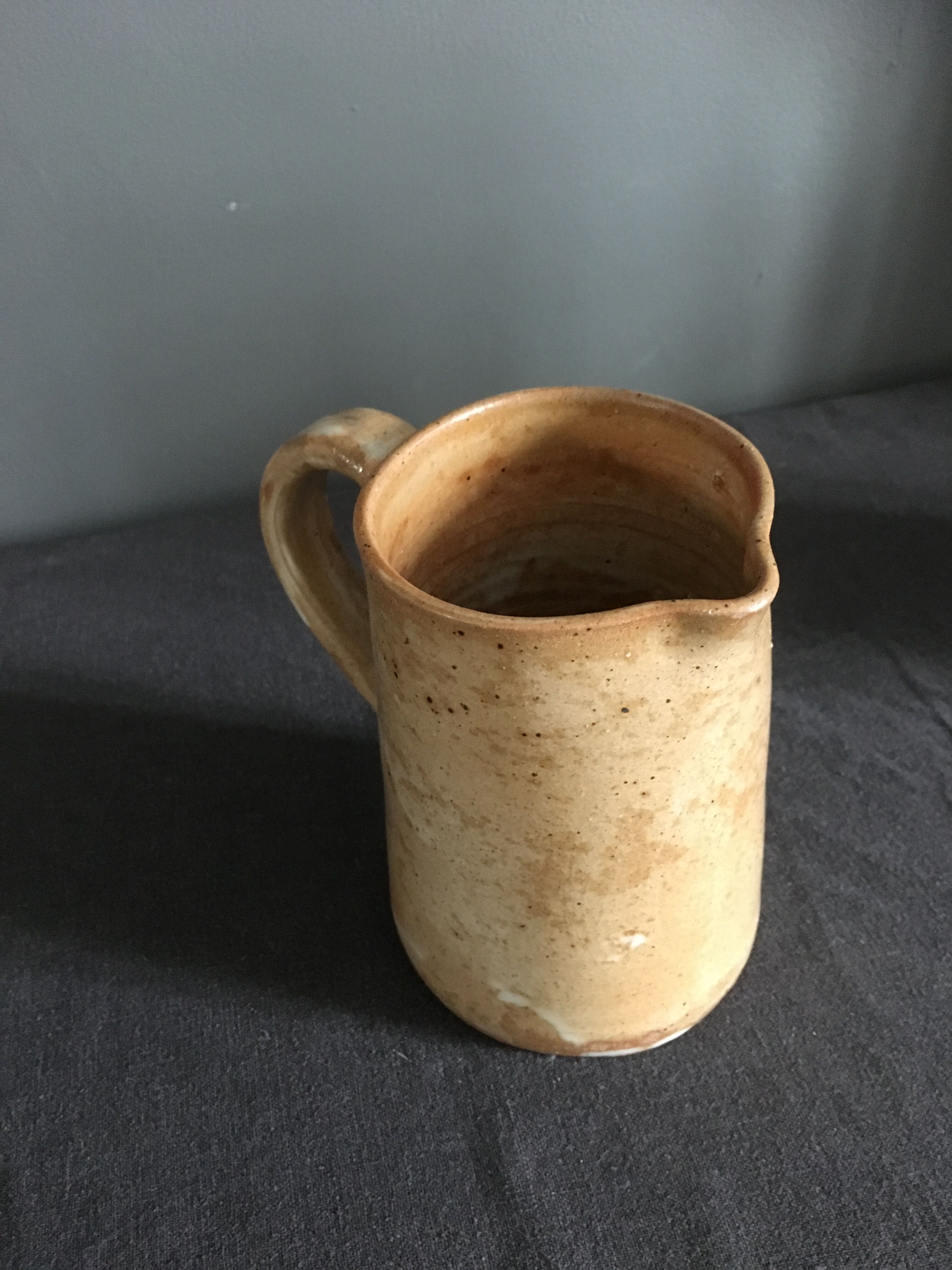 Set of 2 enamelled stoneware jugs
