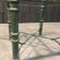 Side table in iron with antique green patina