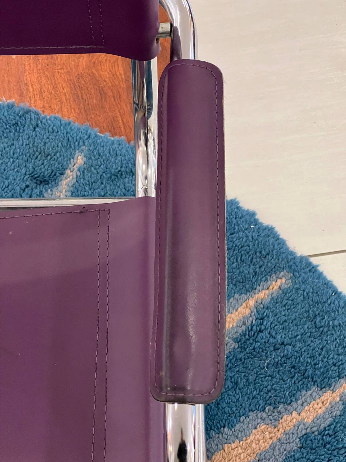 Purple cantilever armchair