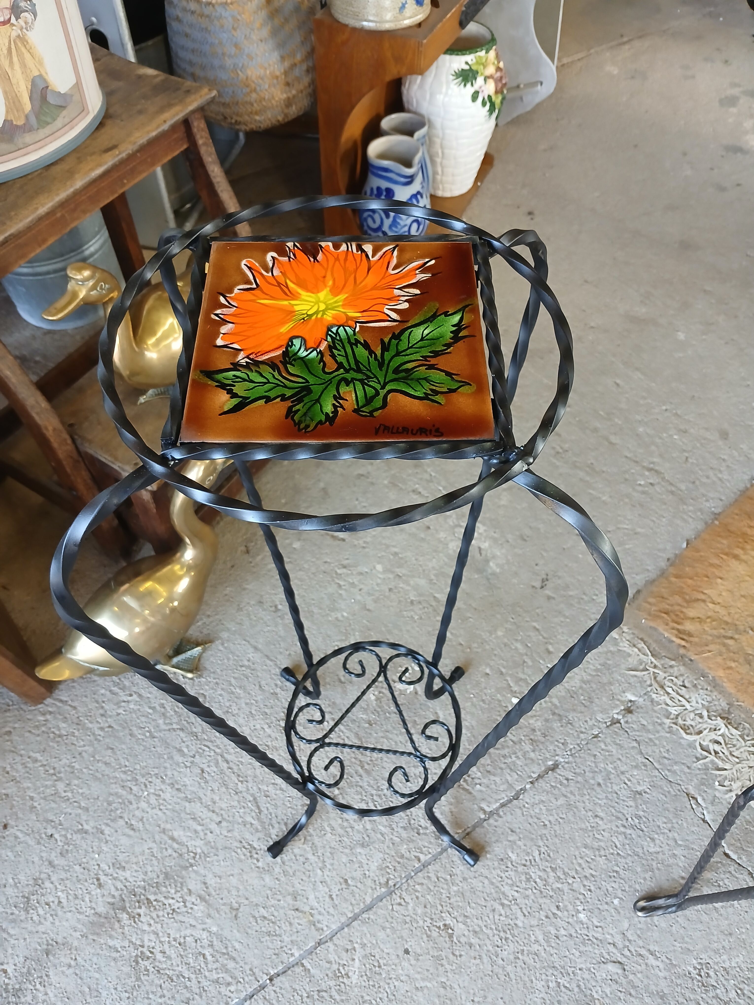Vintage plant stand with Vallauris pottery.