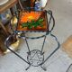 Vintage plant stand with Vallauris pottery.