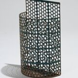 Perforated metal basket, hunchbacked jeans, 1940s