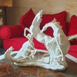 White statue Cavalho" 3 white wild horses