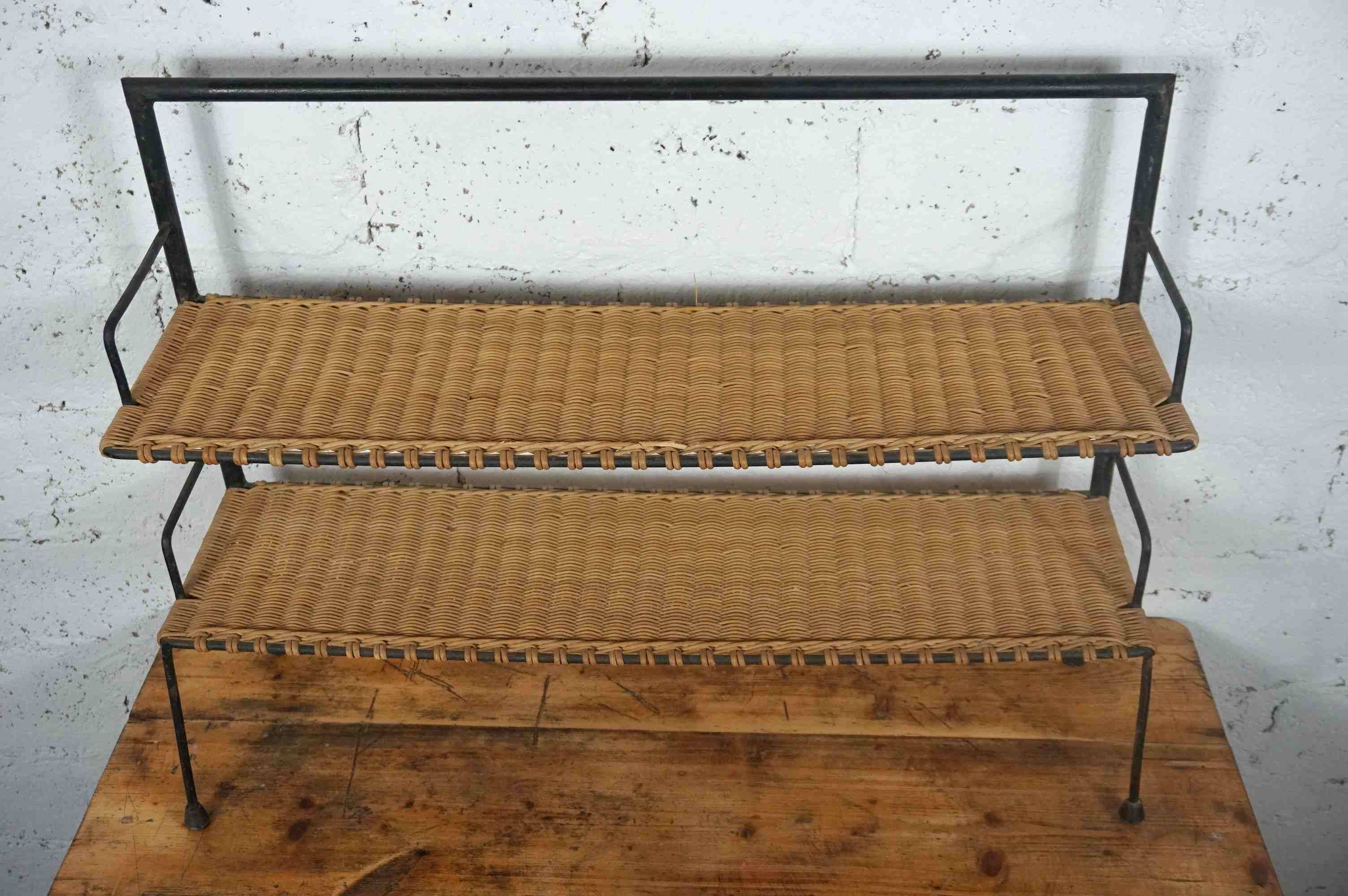 low metal and rattan shelf from the 50s