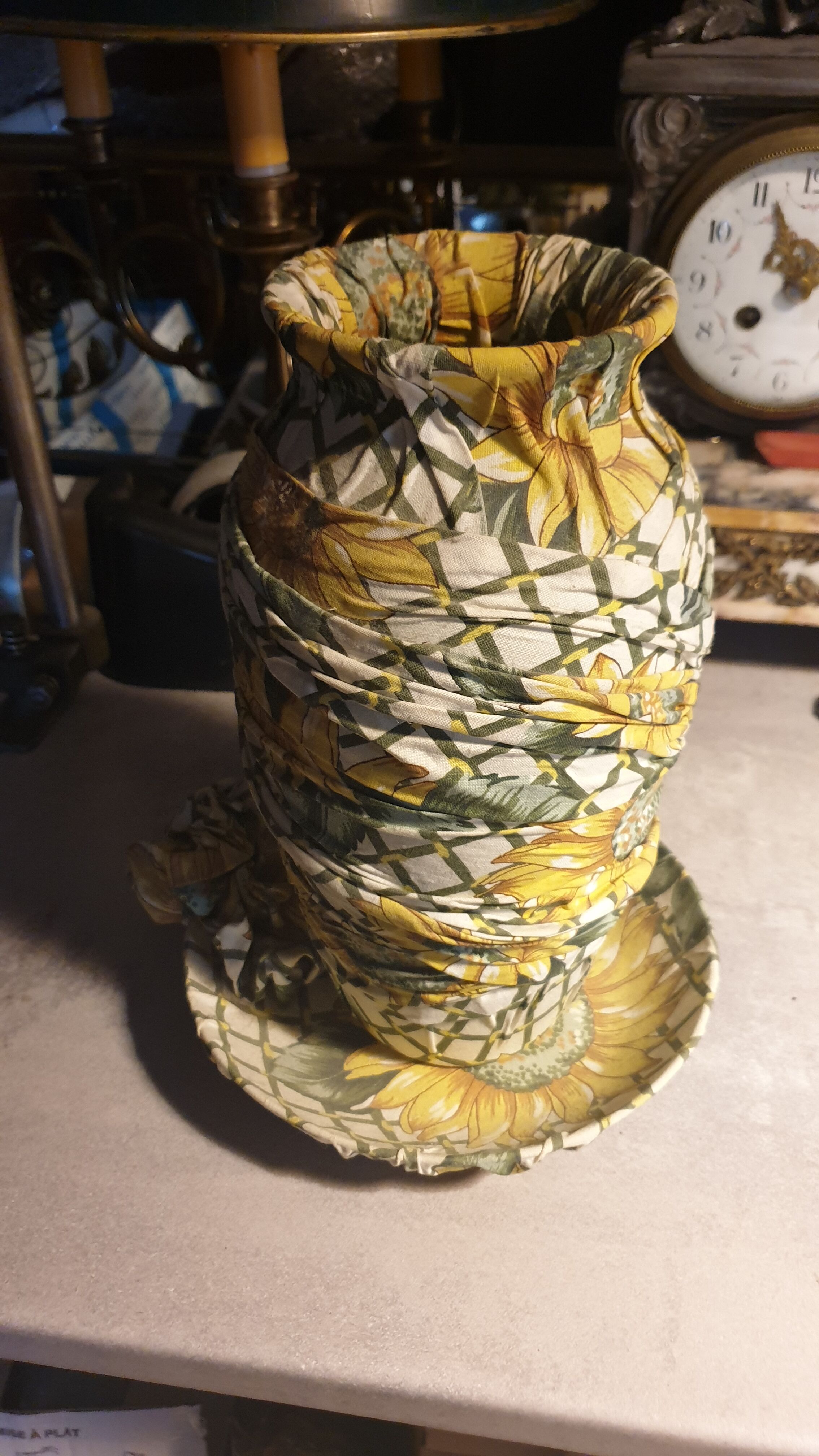 Vase and ceramic cup in fabrics