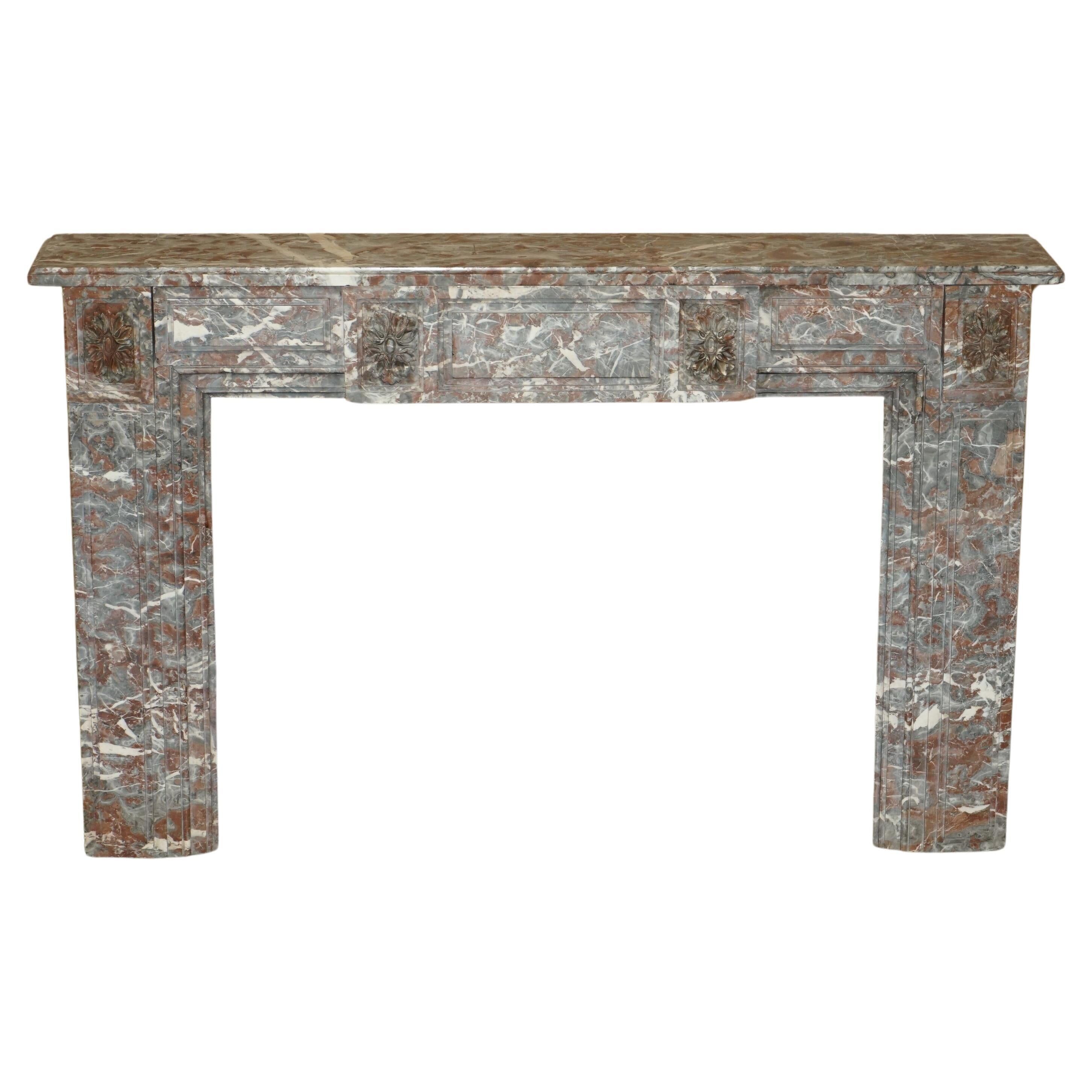 Antique marble fireplace in Saint Remy, Louis XVI style.