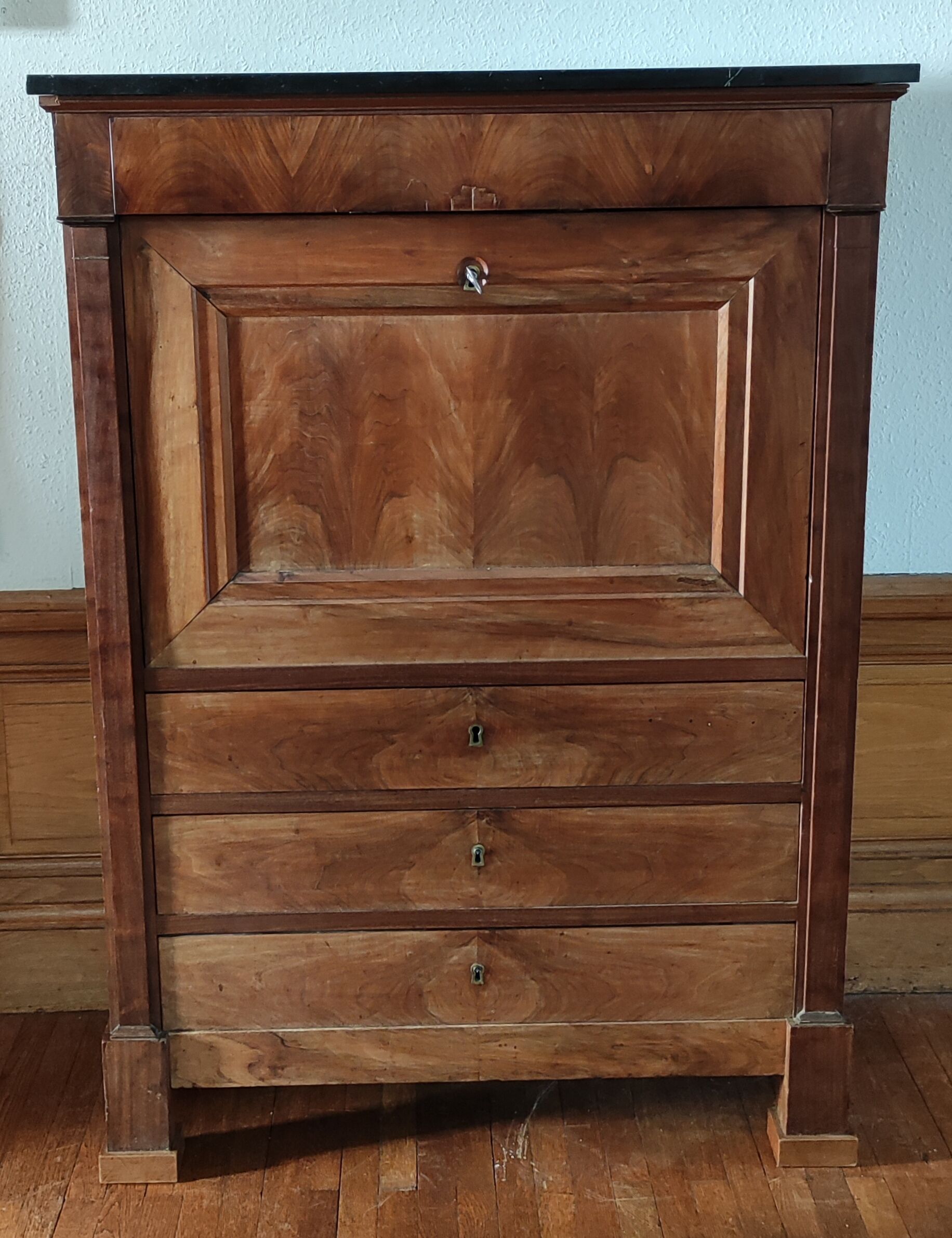 Former mahogany secretary