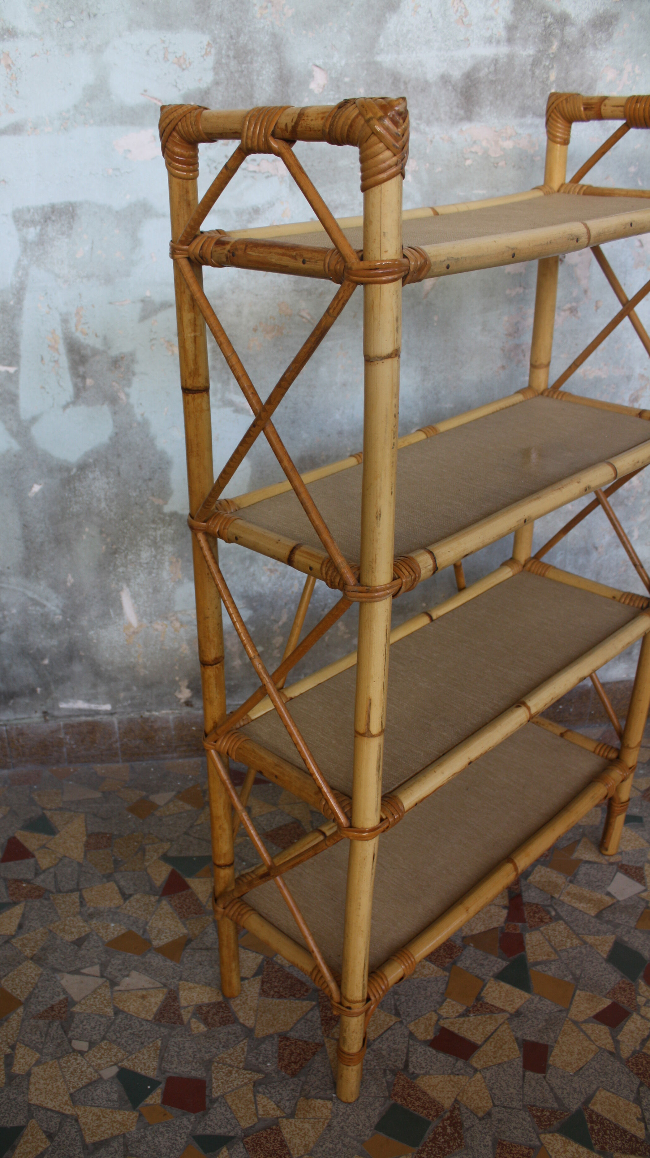 Pair of rattan shelves including a corner shelf