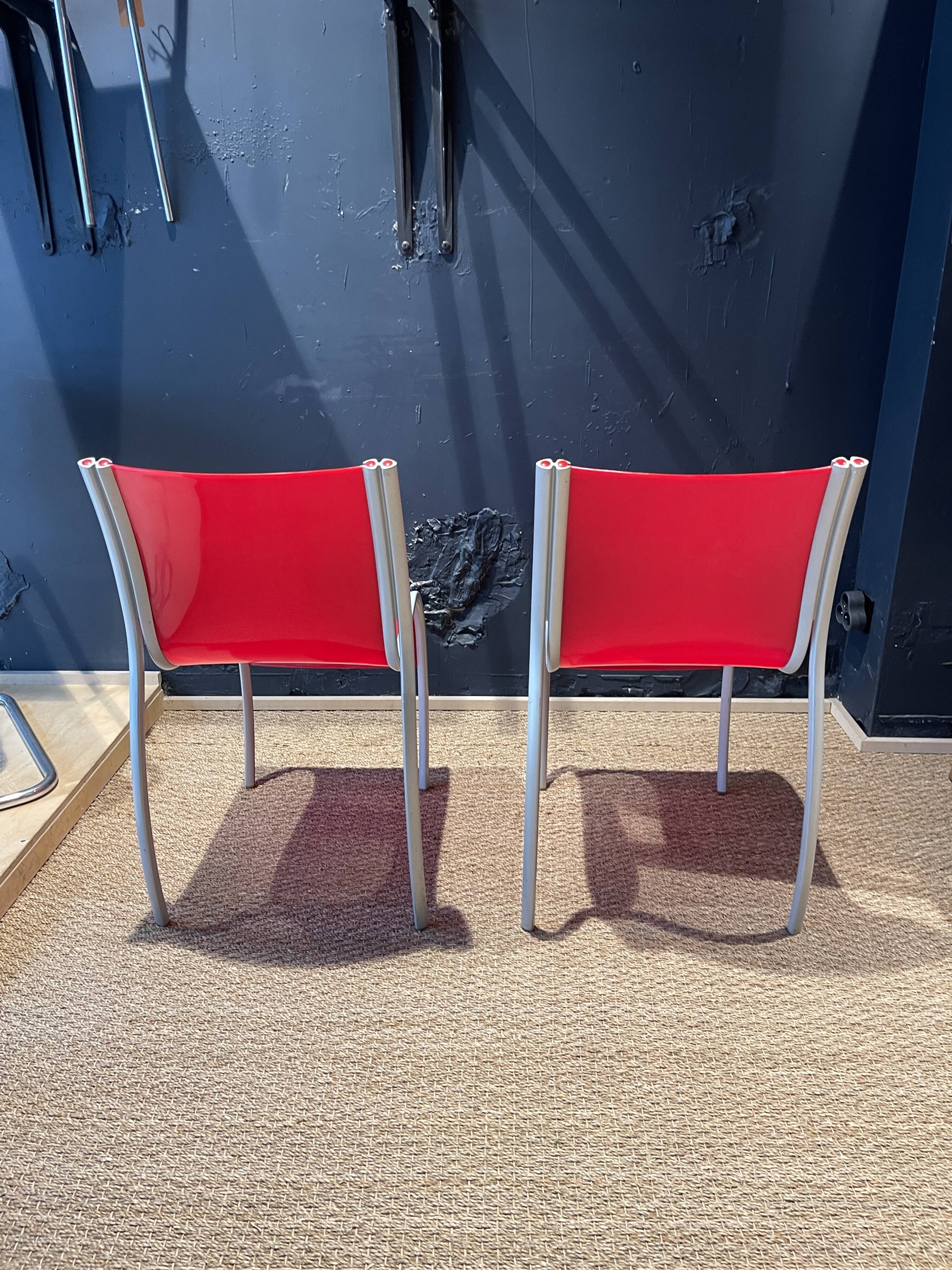 Pair of FPE chairs by Ron Arad for Kartell red Italy 2000s