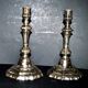 Pair of antique octagonal candlesticks in silvered bronze, Regency style.