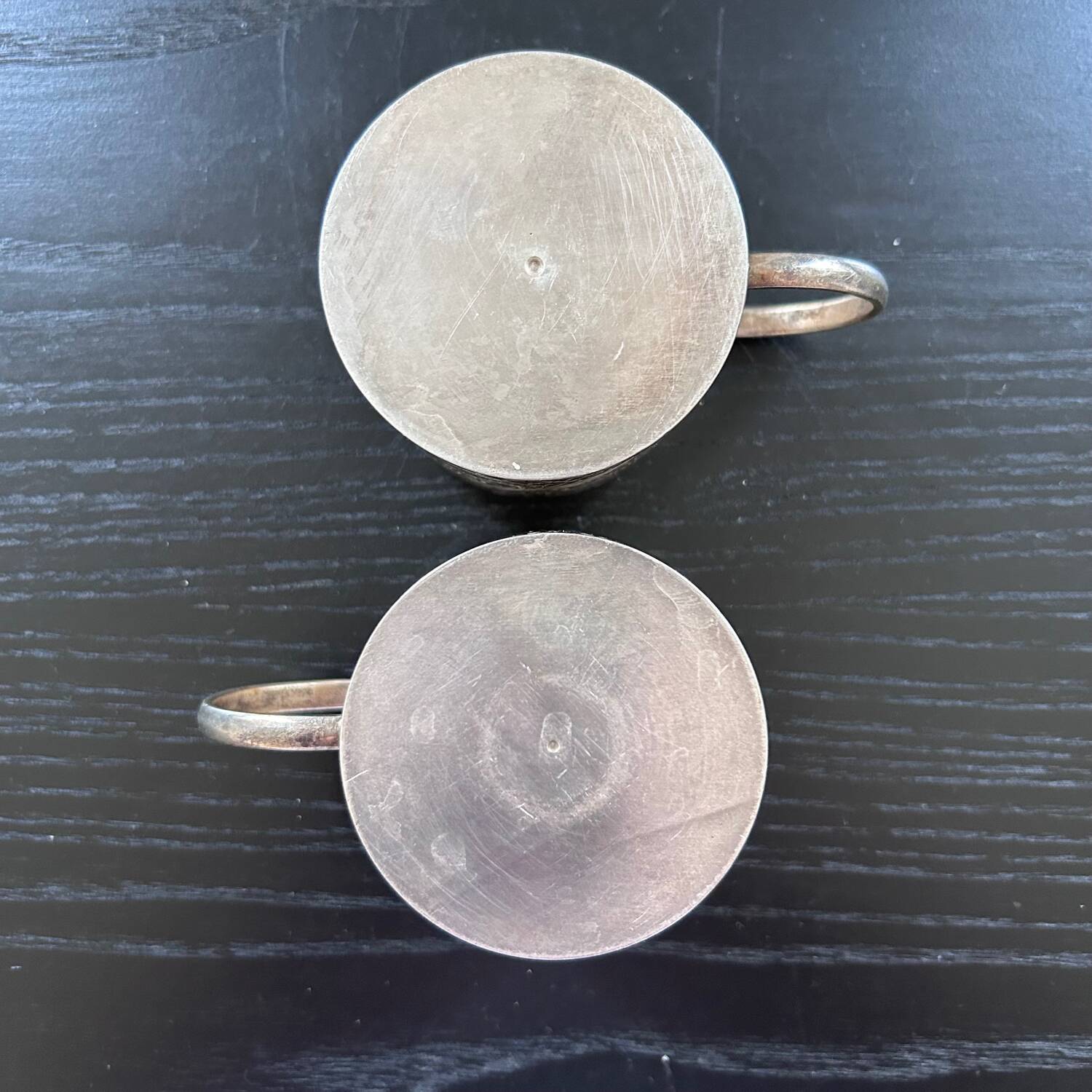 Pair of chiseled silver cups