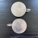 Paire de tasses en argent ciselées