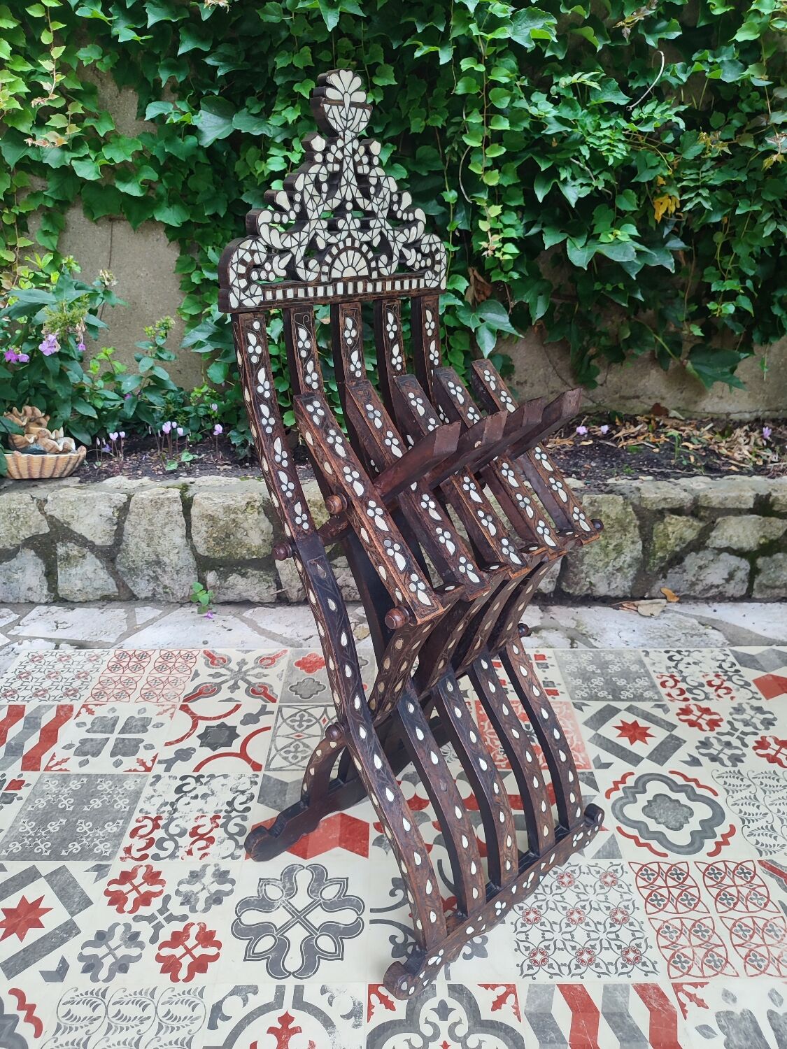 Antique folding oriental chair with mother-of-pearl inlays
