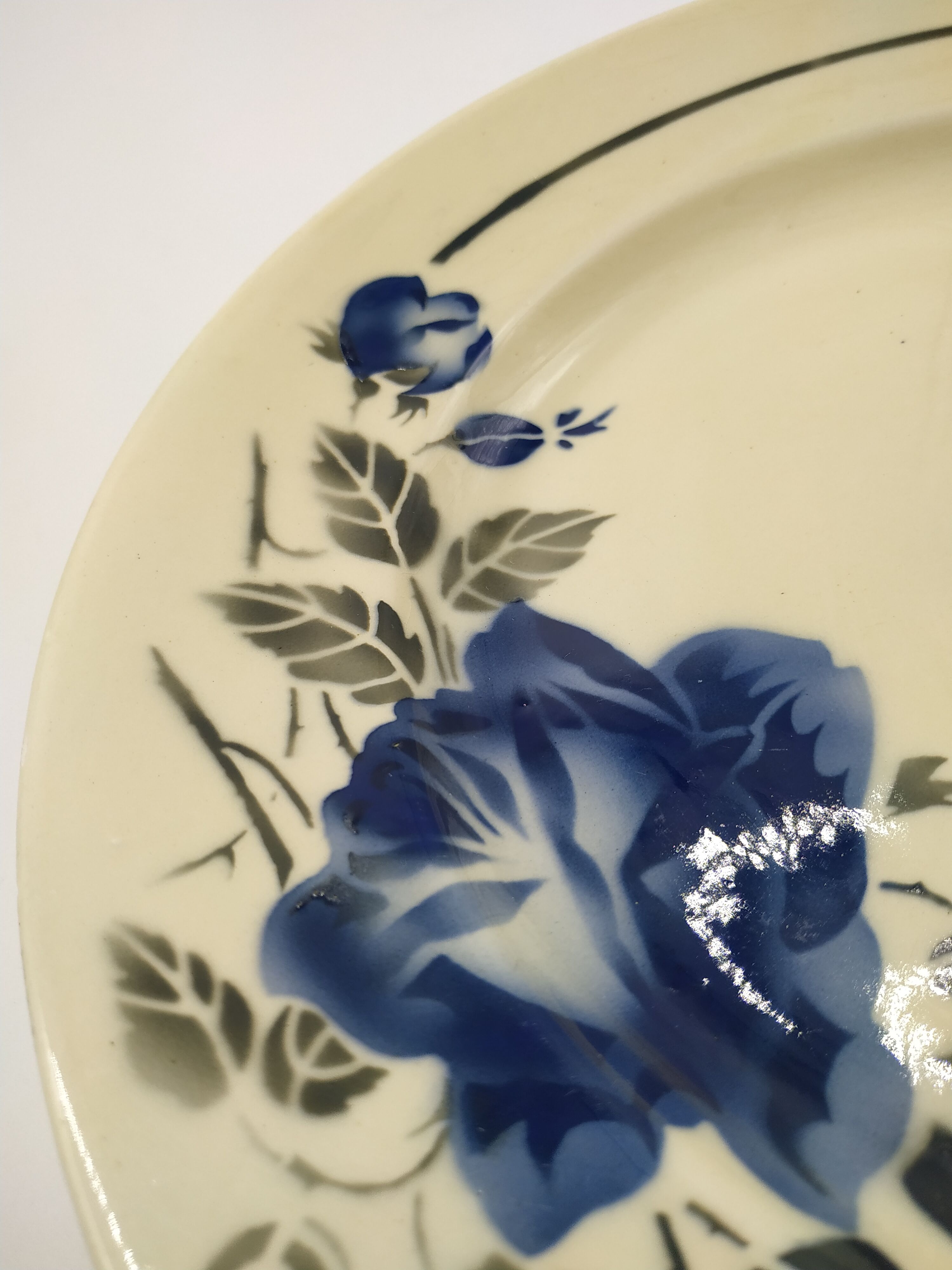 Dish with blue rose