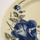 Dish with blue rose