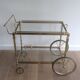 Brass rolling table from the Baguès house.