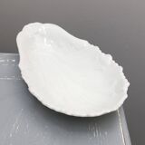 Scallop-shaped pocket emptier