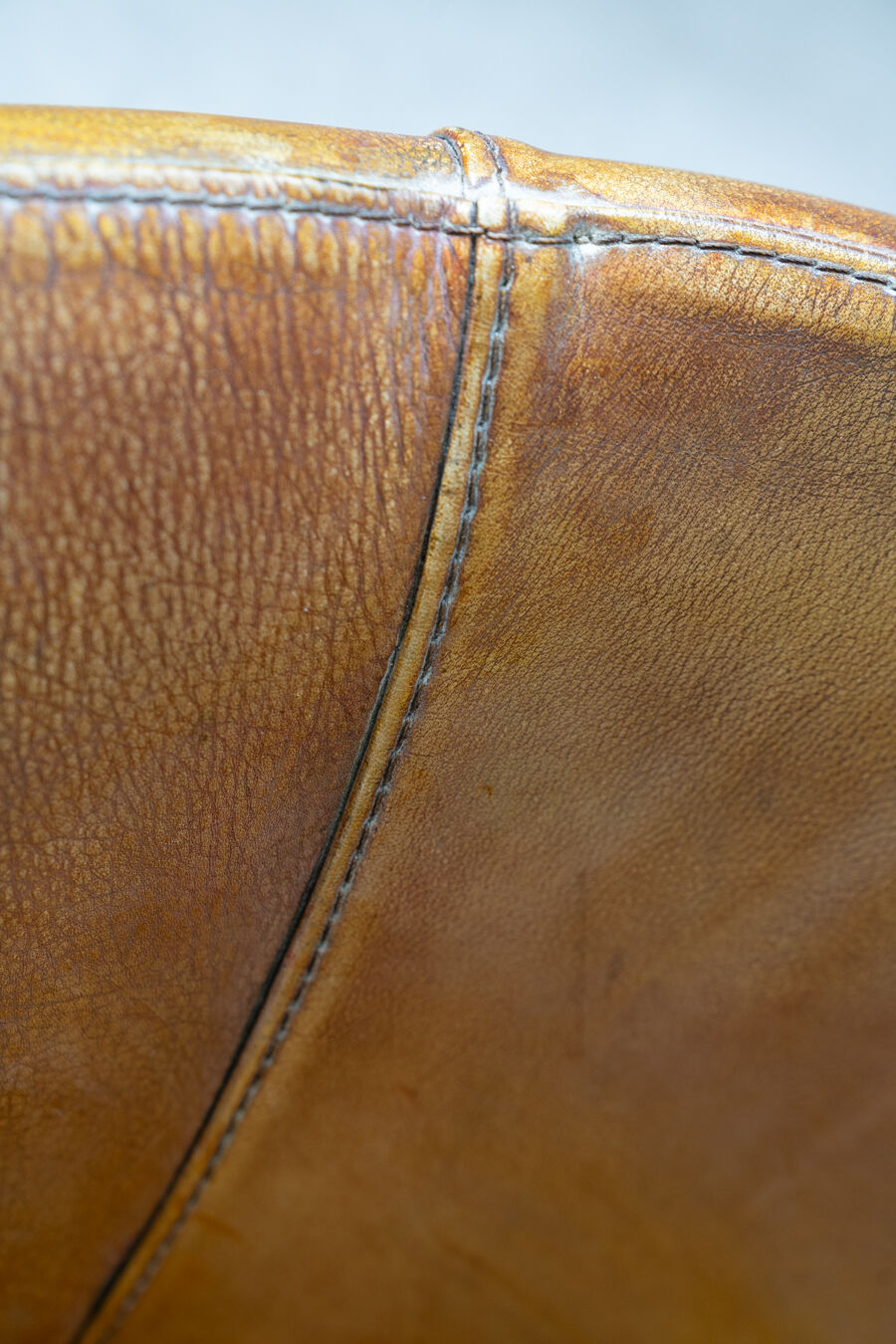 Leather swivel armchairs, early twenty-first century, set of 2