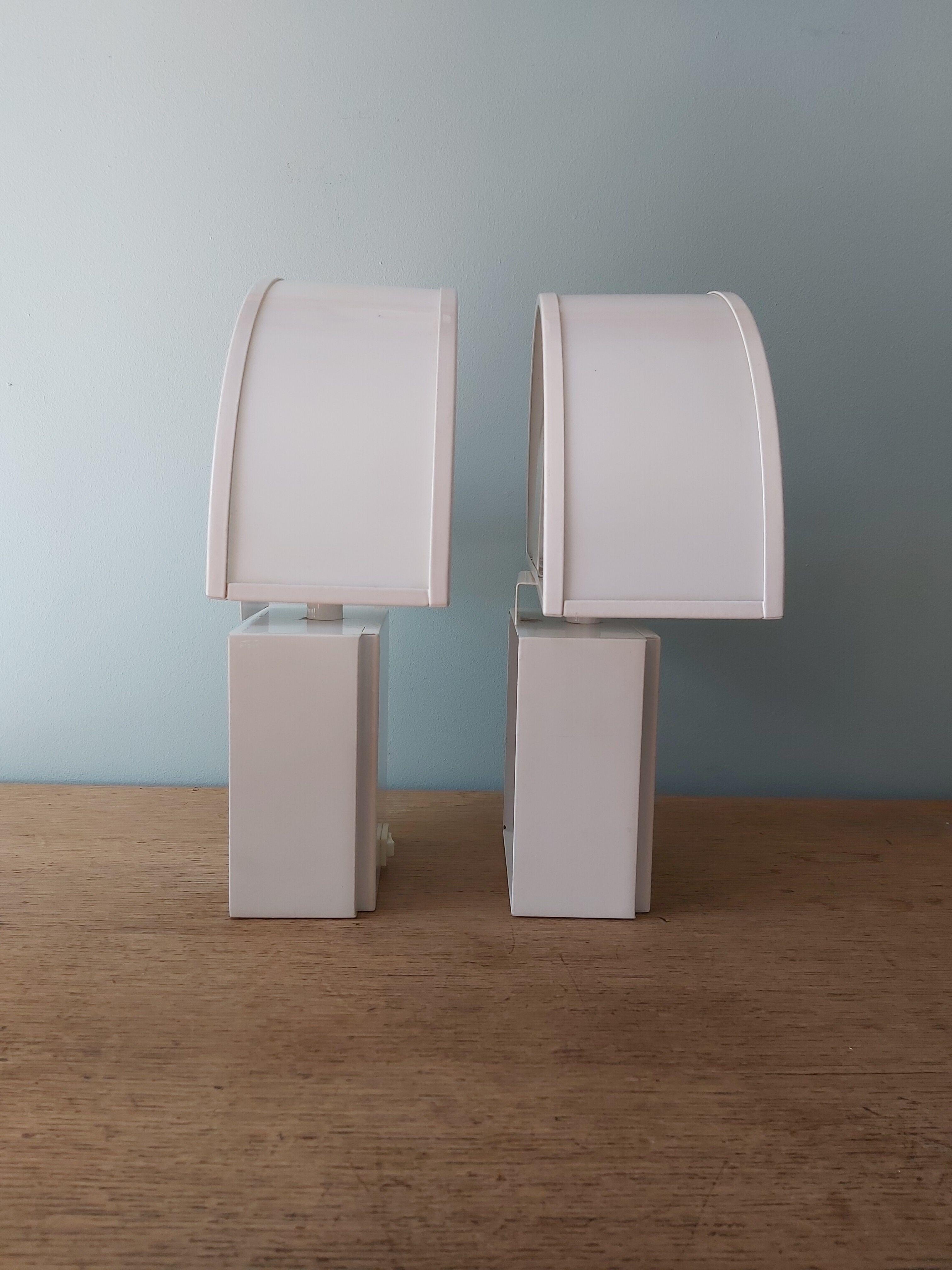 Pair of wall lamps, Olympus model, Harvey Guzzini, 70s